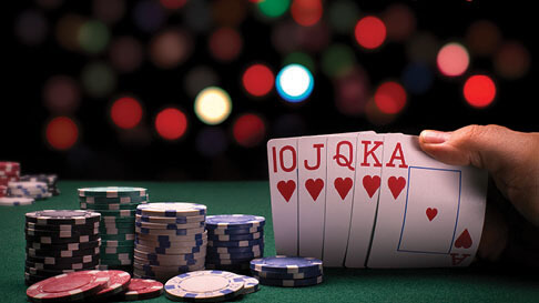 Stack of chips with five cards